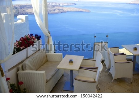 Romantic Restaurant overlooking the Aegean sea, Santorini, Greece