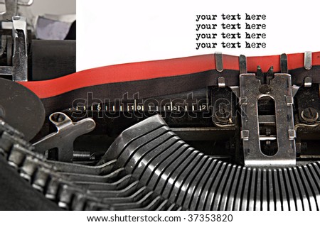 A rusty old typewriter with space on white paper for your text in typewriter fonts