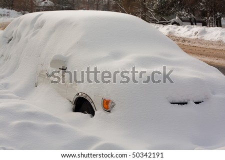 car in snowbank