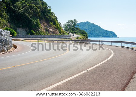 sea side street near the mountain with blue sky in clear day