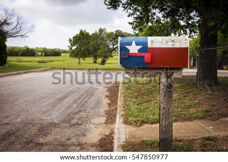 Mailbox painted with the Texas Flag in a street in Texas, USA