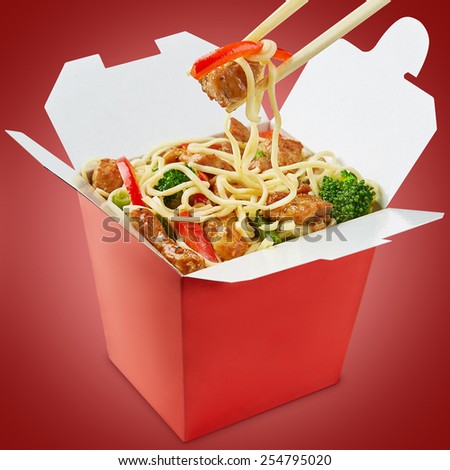 Wok noodles box with chopsticks  isolated on white background