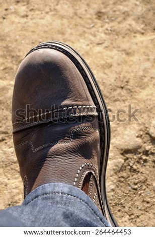 brown shoe on foot
