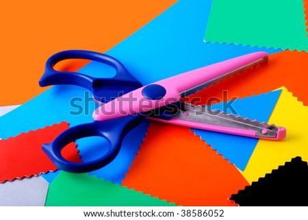 many colourful paper, cutting out scissors