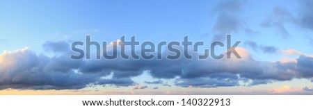Panorama of clouds in the evening sky