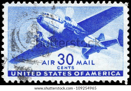 USA - CIRCA 1941: A Stamp printed in USA shows the Twin-Motored Transport Plane, circa 1941