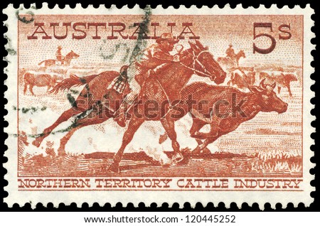 AUSTRALIA - CIRCA 1959: A Stamp printed in AUSTRALIA shows the Aboriginal Stockman Cutting Out a Steer, Northern Territory Cattle Industry issue, circa 1959