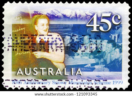 AUSTRALIA - CIRCA 1999: A Stamp printed in AUSTRALIA shows the English class for migrant workers at Cooma, Snowy Mountains Scheme, 50th anniversary, series, circa 1999