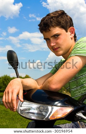 Portrait of a guy on the scooter