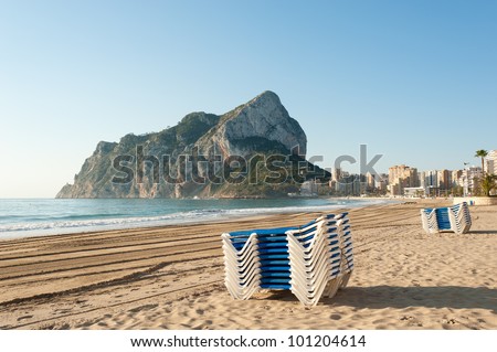 Deckchairs waiting to be deployed for the first sunbathers