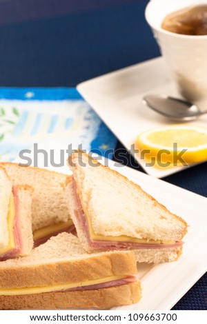 Ham and cheese sandwiches and a black tea, a simple breakfast