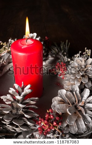 Christmas candle and handmade natural decoration