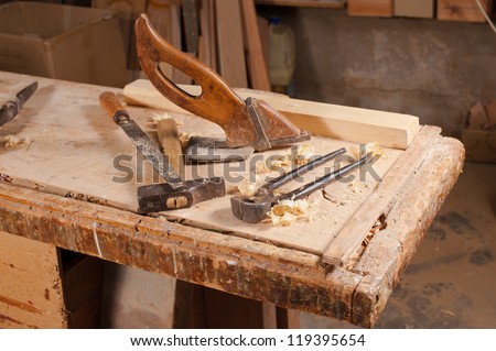 Old carpentry tools on a work bench