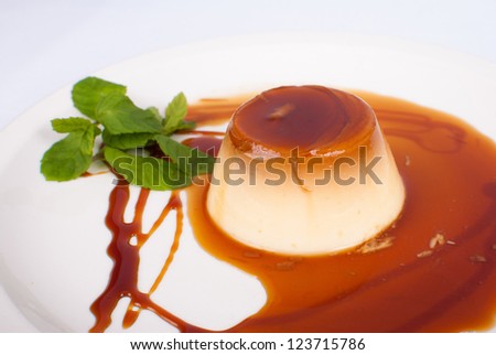 Homemade creme caramel served with sweet syrup, a traditional dessert