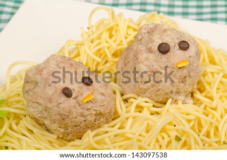 Pasta with meatball faces, funny food for kids