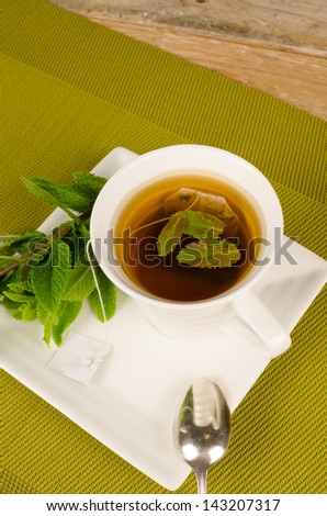 Aromatic tea scented with freshly picked mint leaves