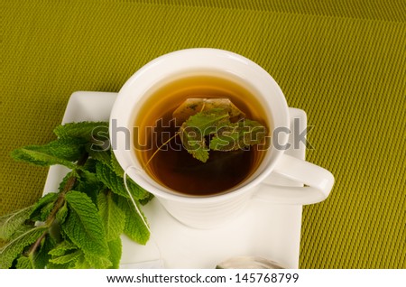 Aromatic tea scented with freshly picked mint leaves