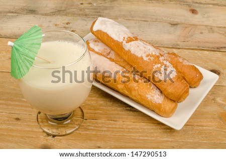 Horchata and fartons, a traditional Spanish snack eaten in summer
