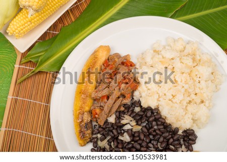 Pabellon criollo, a Venezuelan classic gathering some of the basic Latin American food staples
