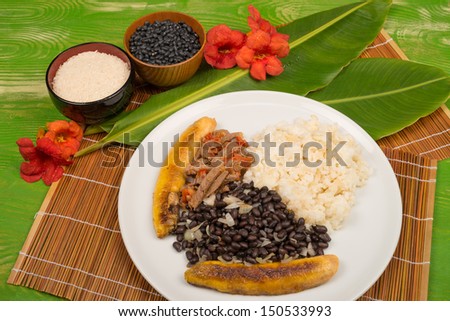 Pabellon criollo, a Venezuelan classic gathering some of the basic Latin American food staples