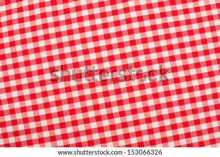 Red and white checkered fabric, traditional picnic tablecloth