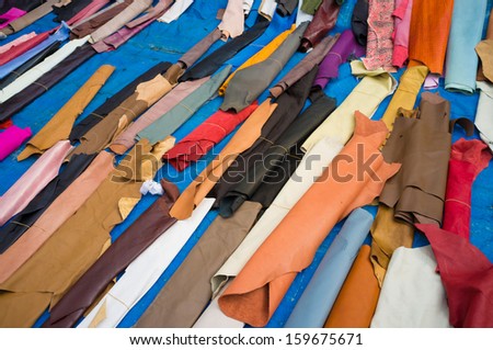 Multicolored leather scraps on a market stall