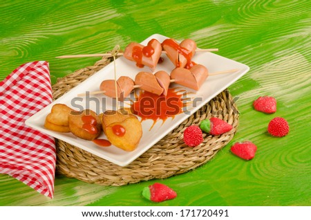 Sausages and  chips in  heart shape, Valentines day fast food