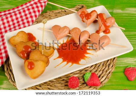 Sausages and  chips in  heart shape, Valentines day fast food