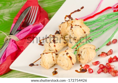 Puff pastry dessert arranged as a bunch of flowers, Valentines  Day food