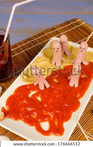 Sausages served in a funny way, a kid snack