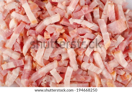 Full frame take of  freshly diced raw bacon