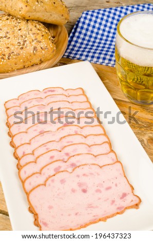 German cold meat snack served with whole wheat buns