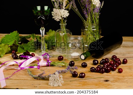 Still life with a rustic table decorated around a wine theme