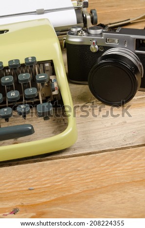Retro typewriter and camera, classic journalist equipment