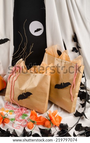 Bags filled with candy in a Halloween party setting