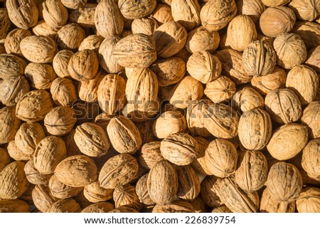 Full frame take of walnuts on display at a street market stall
