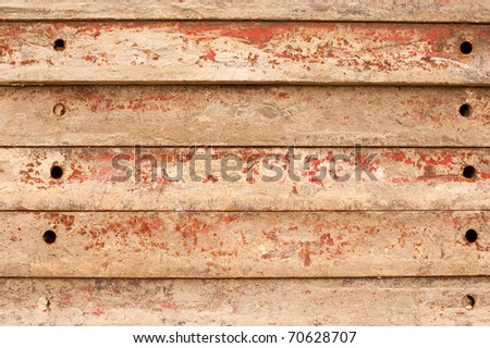 Concrete form boards piled up, a building material background