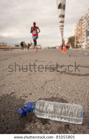 A lonely  long distance runner and a dumped water bottle
