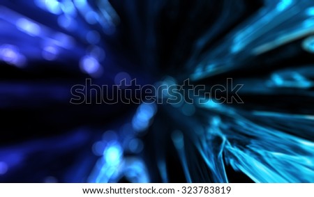 Light particles in motion effect. Radial motion blur / zooming effect.