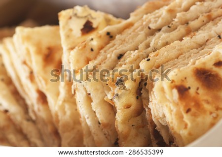 Closeup photo of indian bread with cumin.