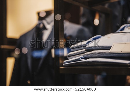 Shirts and suits in a men luxury store