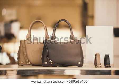 Luxury handbags in a boutique store