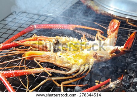 Grilled prawns and lobster on the grill