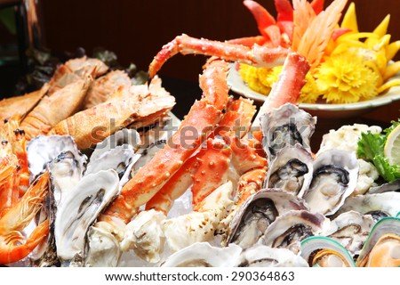 Oyster and Alaska King Crab, Seafood buffet line in hotel restaurant