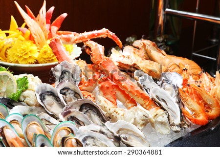 Seafood buffet line (Oyster and Alaska King Crab) in hotel restaurant