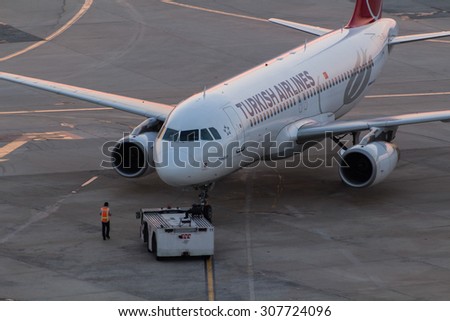 Istanbul, Turkey, August 18, 2015: Turkish Airlines Airplane Execute Push Back Operation at Istanbul Ataturk Airport