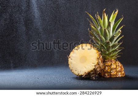 background black blue drops spray pineapple