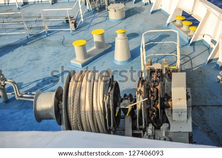 Cable on the blue deck of ship.Ship bow on a blue sky