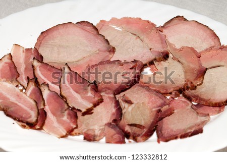 slices of the pickled ham, the neck and the bacon