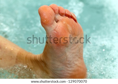 the water massage of tired feet